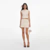 Cream Crochet Flower Knit Mini Skirt Cream Crochet Flower Knit Mini Skirt