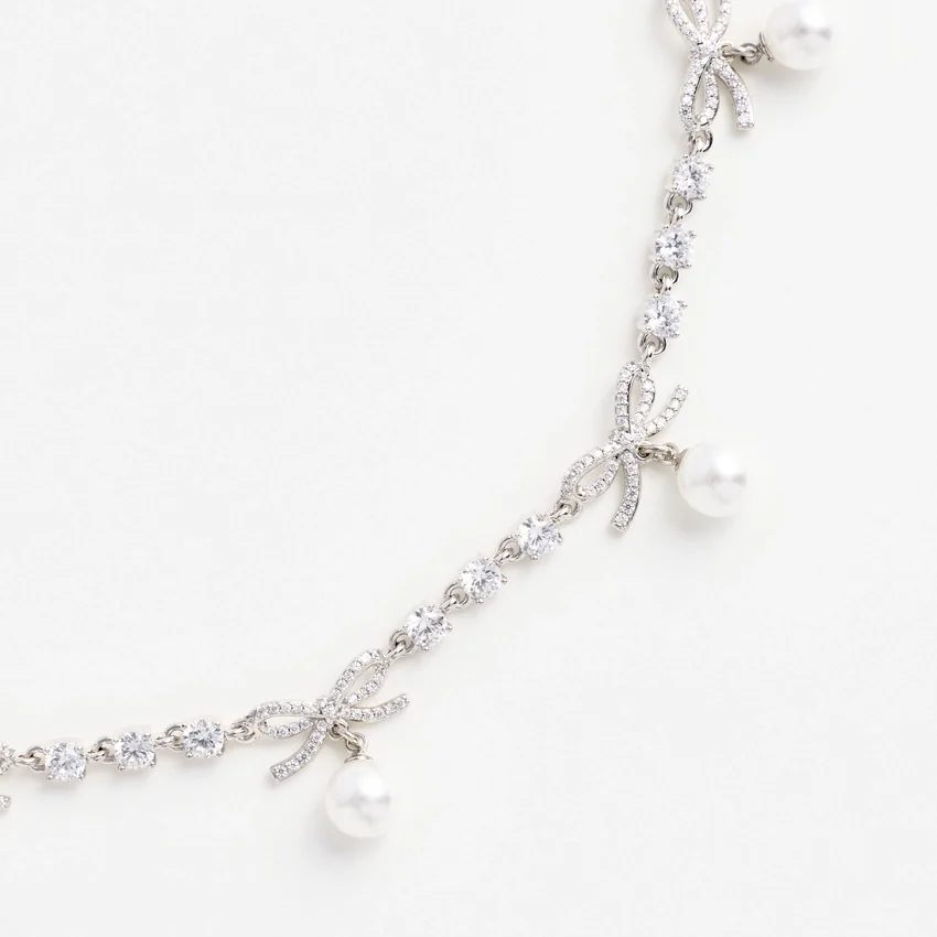 Crystal Bow Pearl Charm Necklace Crystal Bow Pearl Charm Necklace