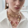 Gold Shell And Pearl Necklace Gold Shell And Pearl Necklace
