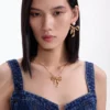 Mottled Gold Bow Pendant Necklace Mottled Gold Bow Pendant Necklace