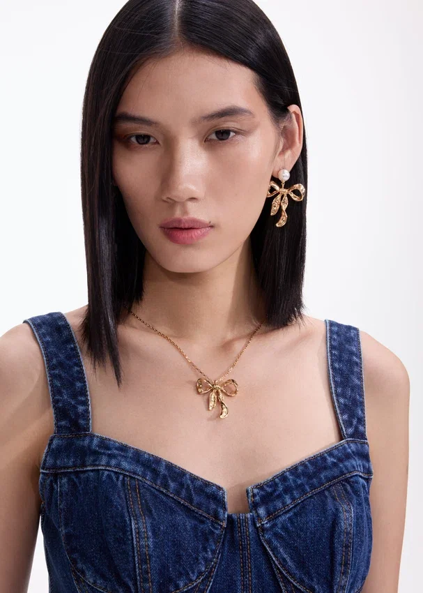Mottled Gold Bow Pendant Necklace Mottled Gold Bow Pendant Necklace